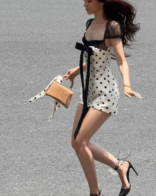 RAJANEE เดรสลายจุดแต่งโบว์ดำ น่ารักแซ่บหวาน Mini Dress thumbnail 2