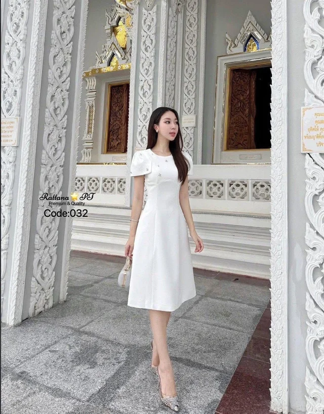 Rattana – เดรสยาวคลุมเข่าสีขาว แขนสั้น เรียบหรู Elegant White Midi Dress (alternate)