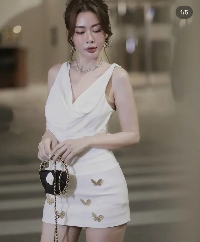 เดรสสายเดี่ยวสีครีมแซ่บหรู Elegant Mini Dress